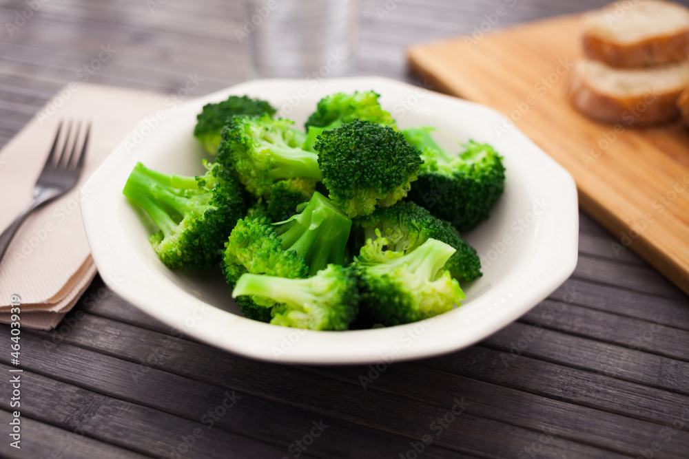 healthy food. steamed broccoli inflorescences in a bowl healthy food. steamed broccoli inflorescences in a bowl