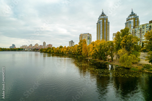 Fototapeta Naklejka Na Ścianę i Meble -  Aerial view of the city by the river in autumn