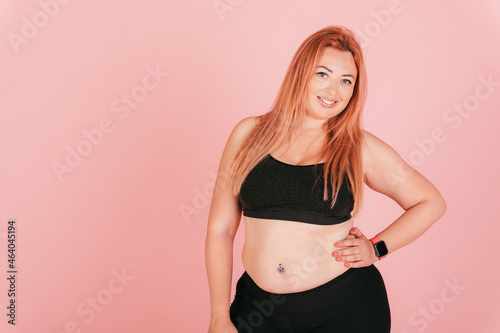Portrait of happy young woman with oversized body