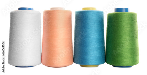 Set of colorful sewing threads on white background