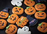 Bright Halloween gingerbread cookies on a black background