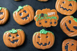 Bright Halloween gingerbread cookies on a black background
