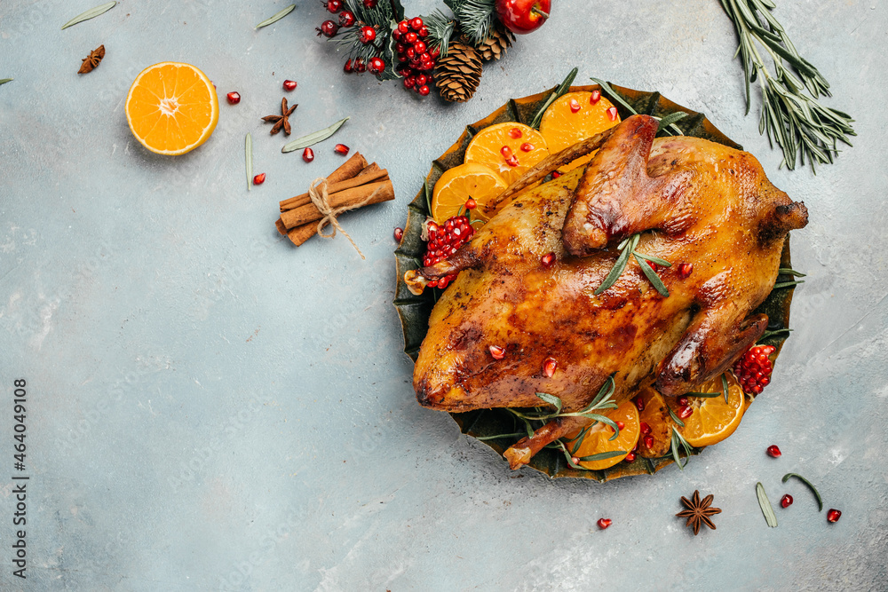 Fotografie Homemade baked duck with rosemary and oranges