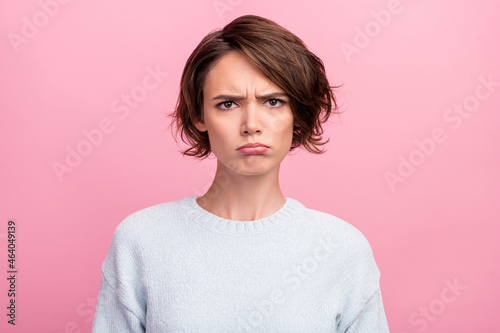 Tableau sur toile Photo of frustrated grumpy sad lady puffed cheeks lips wear blue sweater isolate