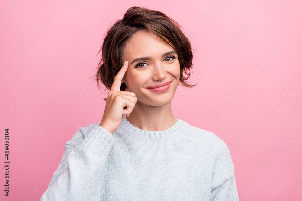 Photo of clever intelligent lady finger head advice think wear blue pullover isolated pink color background Photo of clever intelligent lady finger head advice think wear blue pullover isolated pink color background