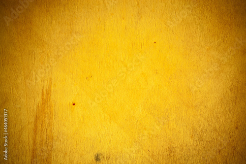 Yellow wooden board background.