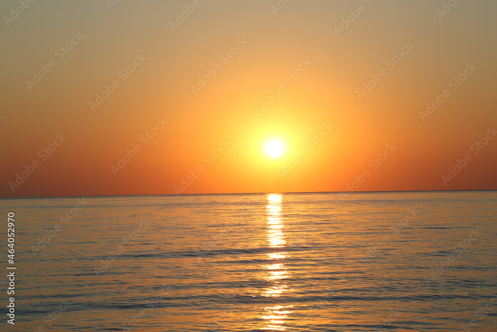 sunrise over a perfect calm mediterranean sea