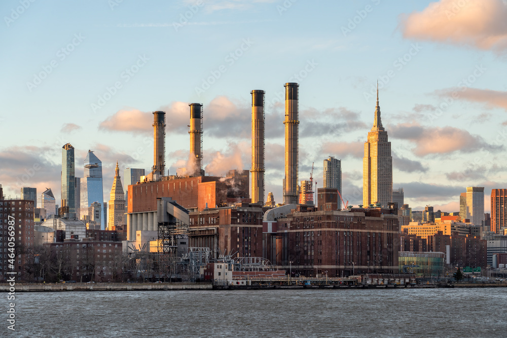 Manhattan skyline and Empire State Building at sunset, New York City, USA Manhattan skyline and Empire State Building at sunset, New York City, USA
