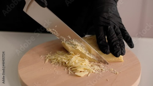 Chef cuts the cocoa butter to make homemade chocolate