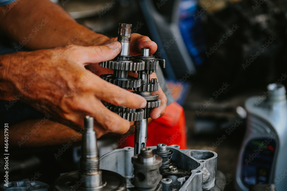 Maintenance and repair of the motorcycle engine transmission system by
