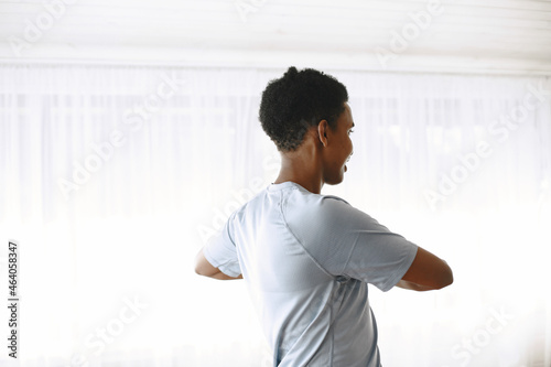 Indian man doing sport exercise at home © hetmanstock2