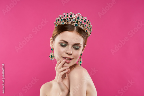 attractive woman with a crown on her head makeup decoration Studio Model