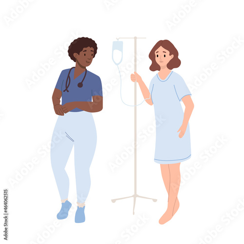 Female patient with dropper at hospital. Woman standing with intravenous dropper line. Vitamins dripping, Iv therapy, cancer disease, oncology. Doctor or nurse in face mask talking to patient