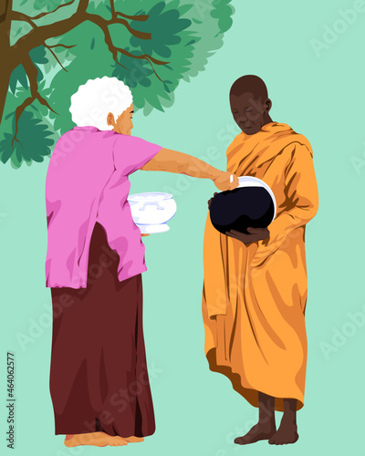 Elder woman making merit with buddhist monk