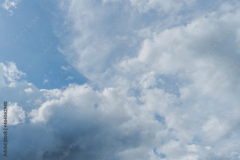 Blue sky and white clouds. Bfluffy cloud in the blue sky background. Blue sky and white clouds. Bfluffy cloud in the blue sky background.