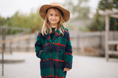 Young little lady girl outside in park