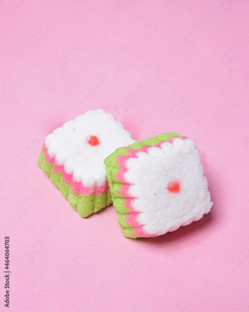 Putu Ayu cake is in the form of a box with three colors, namely green, red and white. This cake has a soft and tender texture. Putu Ayu can be found in markets or shops. Market snacks. Focus blur. Putu Ayu cake is in the form of a box with three colors, namely green, red and white. This cake has a soft and tender texture. Putu Ayu can be found in markets or shops. Market snacks. Focus blur.