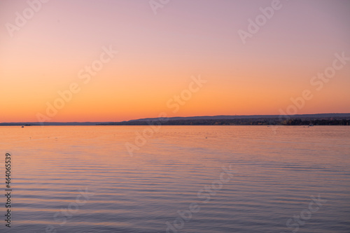 Beautiful sunrise reflecting on calm water