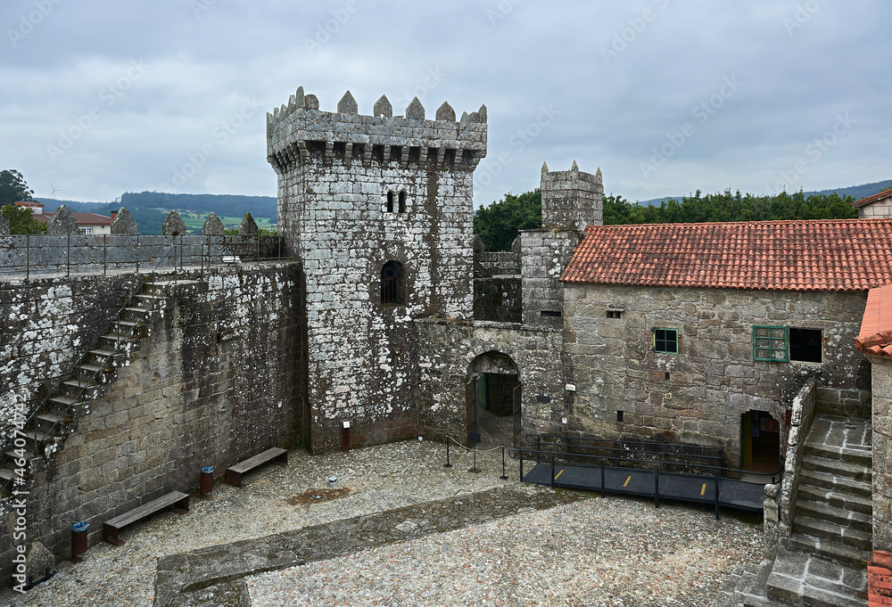 Obraz premium inner courtyard of the castle, tower, battlements, merlons and red tile roofs