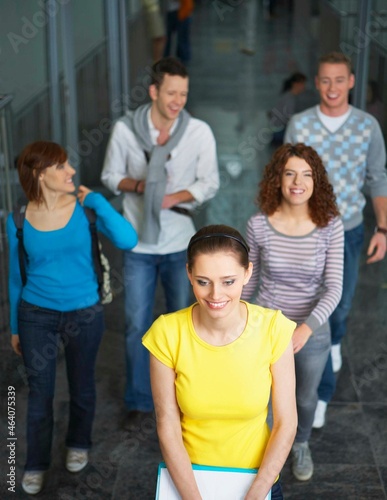 University students walking in corridor