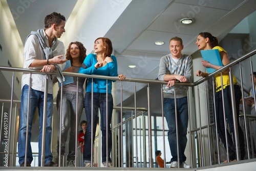 Smiling university students on staircase