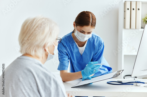 elderly woman and doctor professional examination checkup