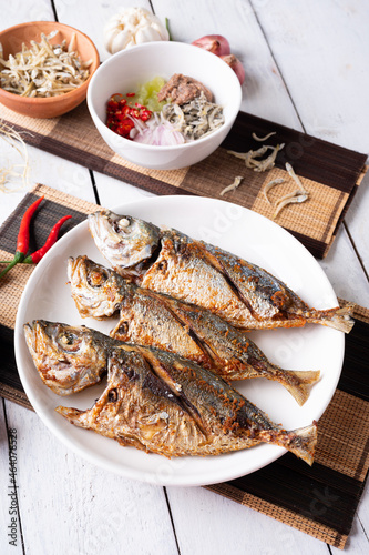 Deep fried mackerel with fish sauce, Traditional Thai food.