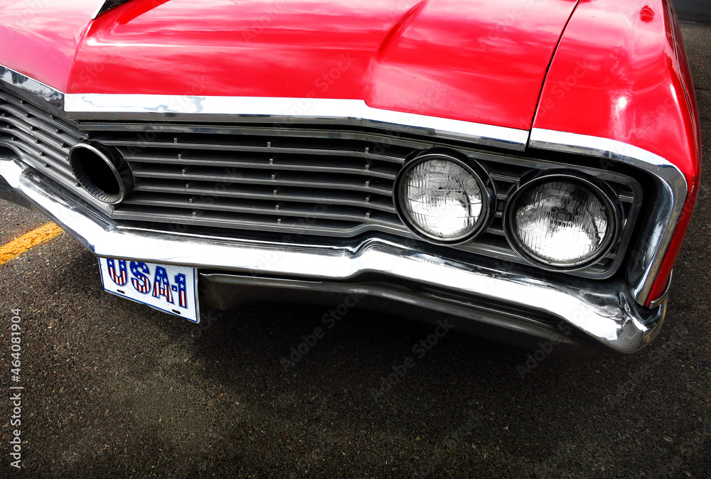 Red Muscle Car with USA License Plate On Street Ready to Drive Fast and Race