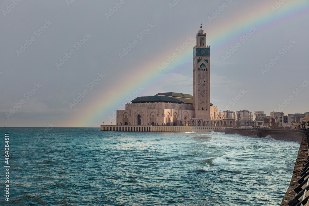 view of Hassan II Mosque in winter with a rainbow - Casablanca, Morocco