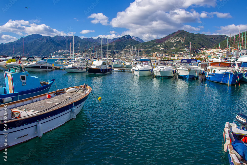 Amazing sunny day oin October in harbor od Salerno : pleasure boats and fishing  boats