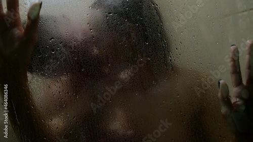 sexy woman and man are having sex in shower, love and passion in bathroom photo