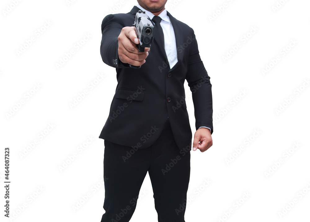 A gun man in black suit is gesturing and aiming gun at his target in a ...