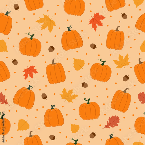 Autumn seamless pattern. Pumpkins, leaves, acorns and dots on pink background. Background for autumn decorative design