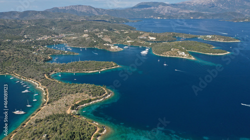 Aerial drone photo of safe anchorage of fjord bays in Meganisi island with crystal clear calm sea, Meganisi island, Ionian, Greece