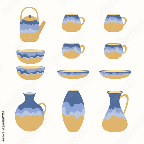 A set of ceramic kitchenware for serving  and interior decor. Plates, cups, teapot, jug, vases on a white background