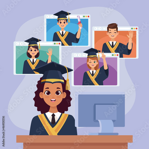 group of graduates with desktop