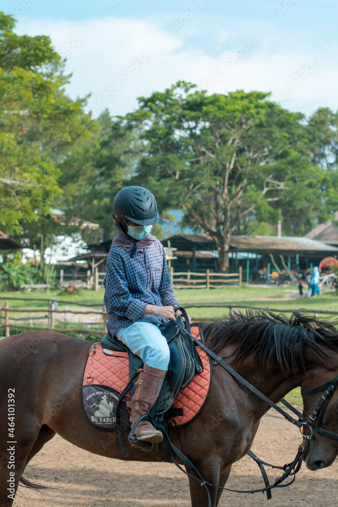 Girls ride on store horse