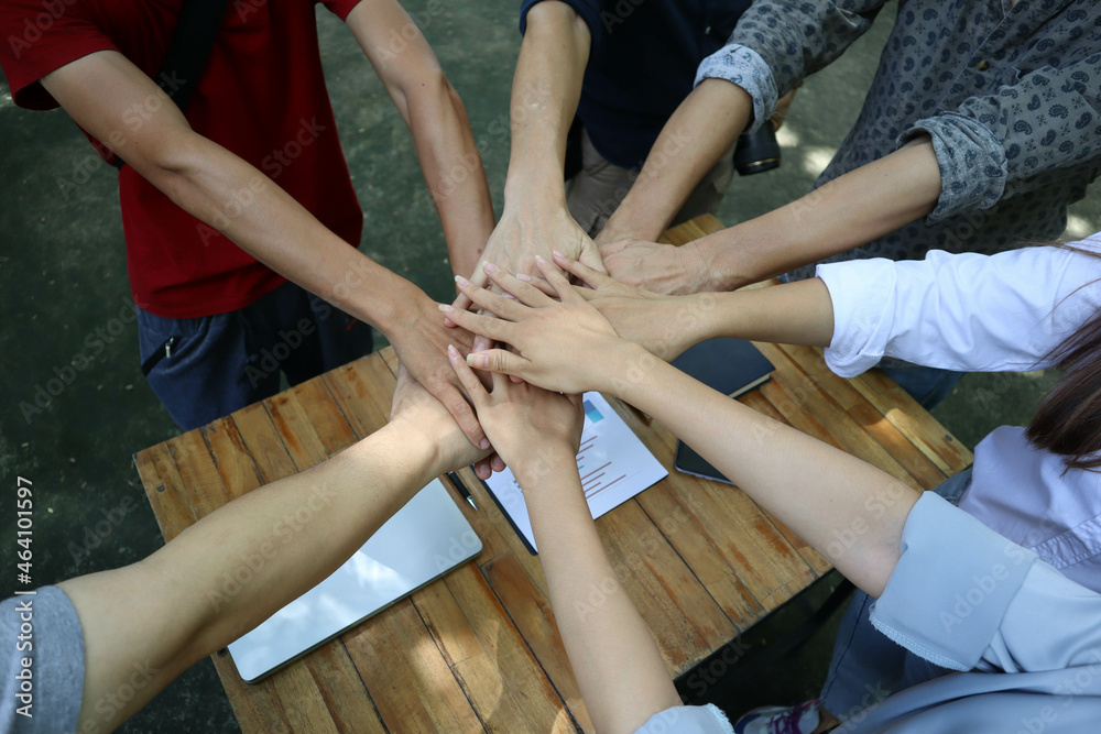 Hand team of cooperation in the construction business.To succeed in developing sustainable partnerships.concept Hand team of cooperation in the construction business.To succeed in developing sustainable partnerships.concept