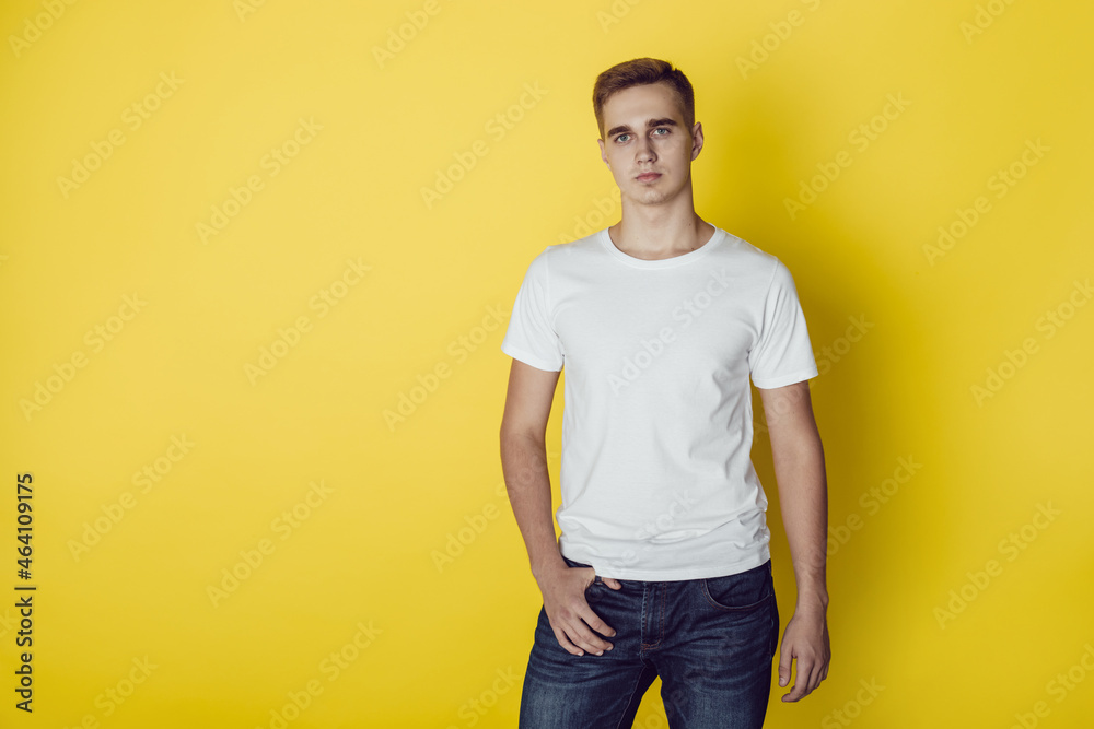 Young man in white t-shirt. Mock-up. Young man in white t-shirt. Mock-up.