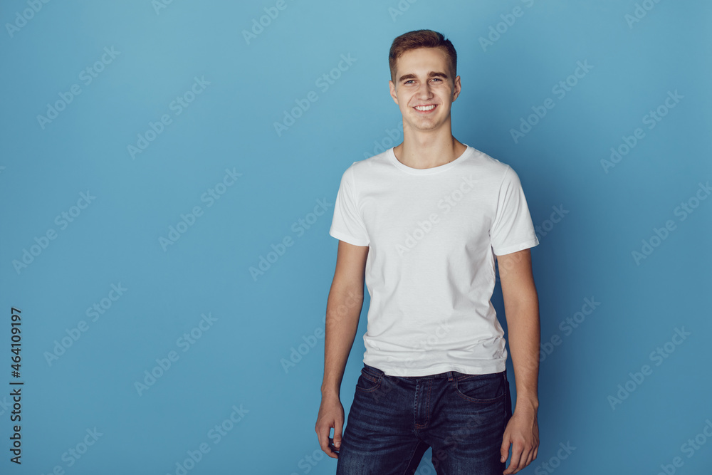 Young man in white t-shirt. Mock-up. Young man in white t-shirt. Mock-up.