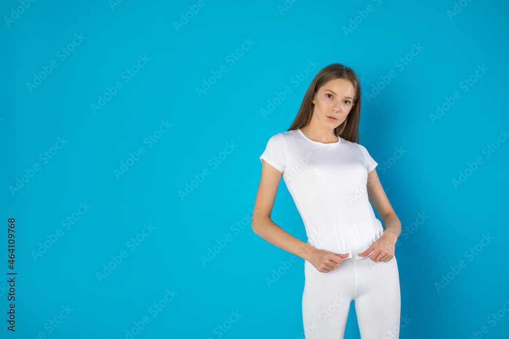 Beautiful young woman in white t-shirt. Mock-up. Beautiful young woman in white t-shirt. Mock-up.