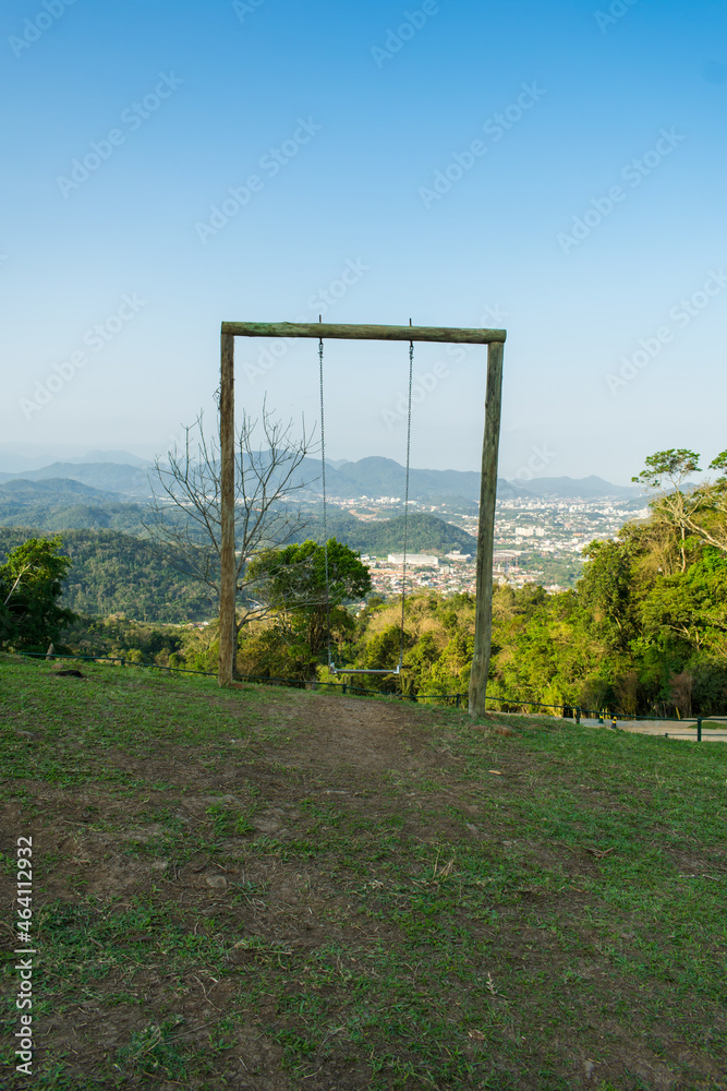 Swings and view of Jaragua do Sul from Pico Malwee - Santa Catarina, Brazil Swings and view of Jaragua do Sul from Pico Malwee - Santa Catarina, Brazil