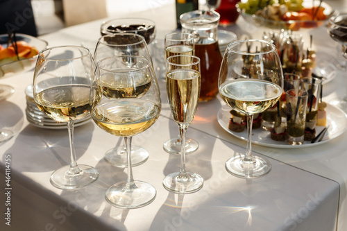 Arrangement of glasses full of wine. Alcoholic beverages in party celebration. Professional restaurant serving in banquet, luxury event