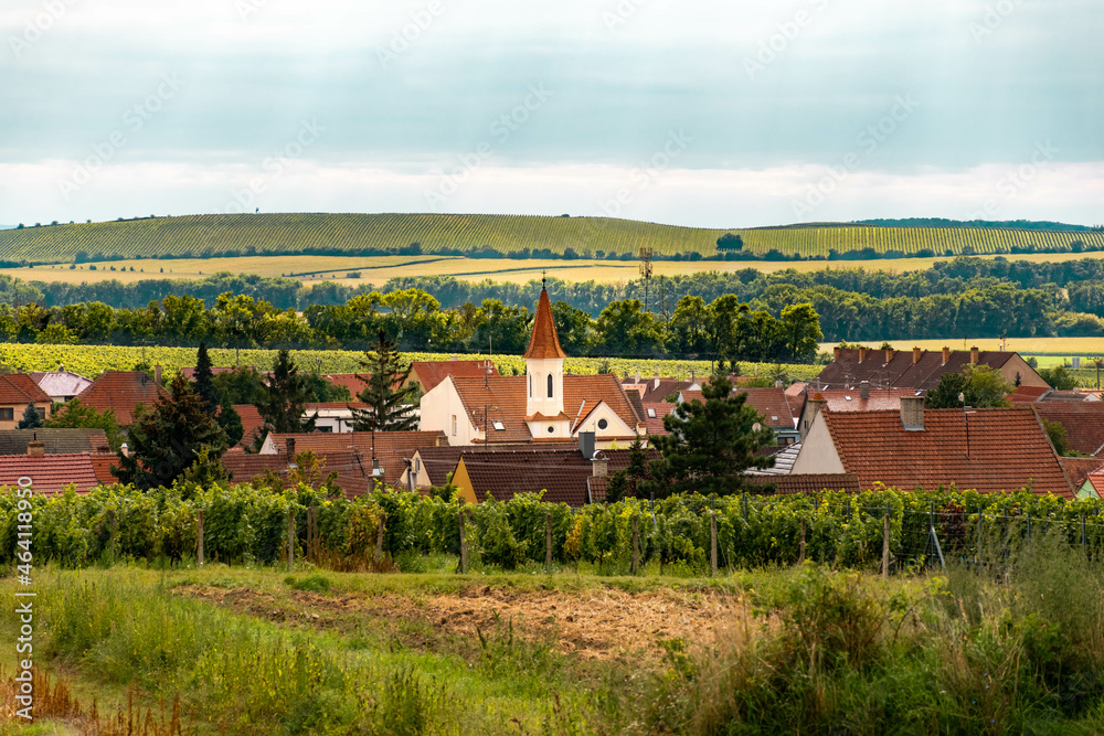 town hall in the city of perna, south moravia, beautiful panoramic view of the town at sunset, hilly landscape