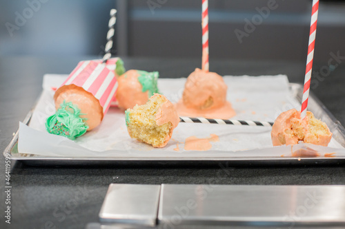 Giant Sweet Cupcake Cake Pop with Green Frosting and pink chocolate and multi colored Sprinkles