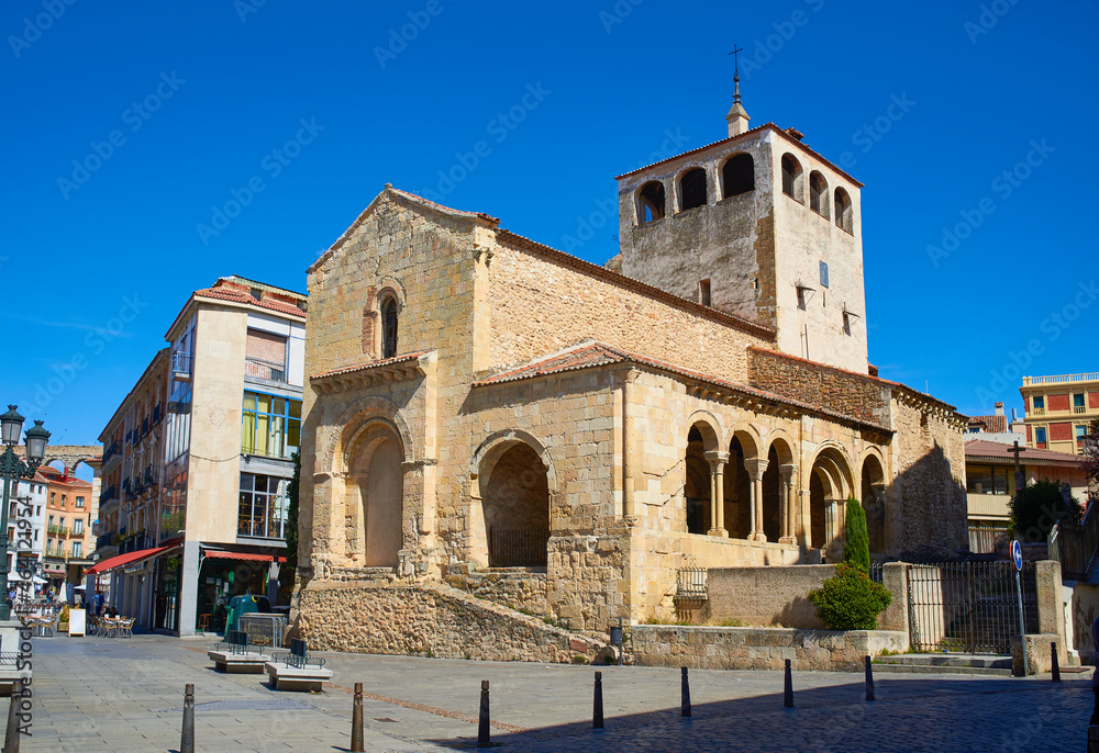 Principal facade of the San Clemente church, a Romanesque temple built in the XII century. View from Acueducto Avenue. Segovia, Spain.