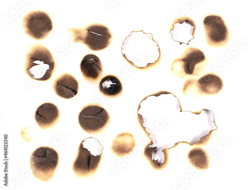 Set of burnt holes of paper, texture and background