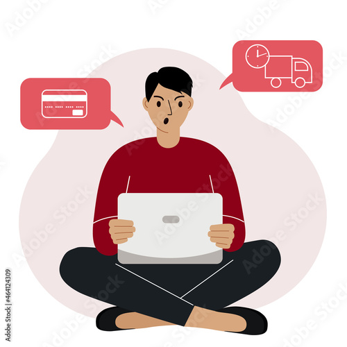 Online shopping. The man is sitting with a laptop. The buyer orders the product online. Dissatisfied with the service.