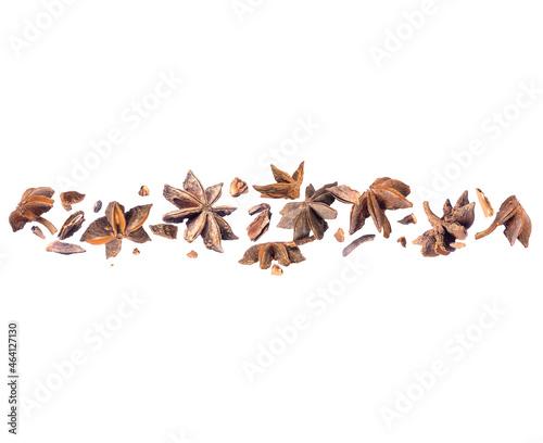 Crushed star anise in the air isolated on a white background