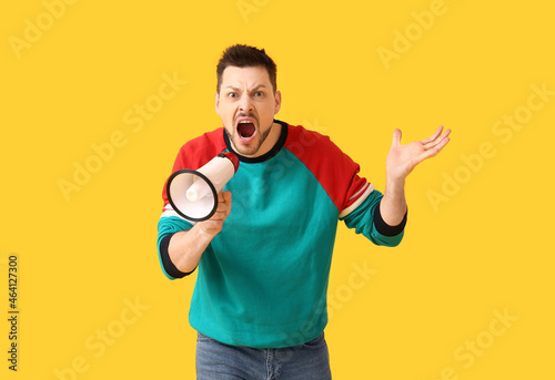 Protesting man with megapho...
